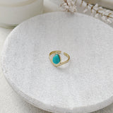 Gold ring with a turquoise stone