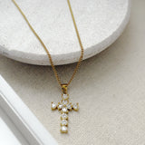 Gold cross necklace with clear stones