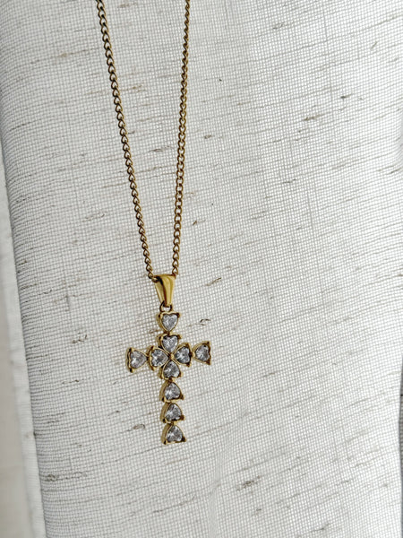 Gold cross necklace with clear stones